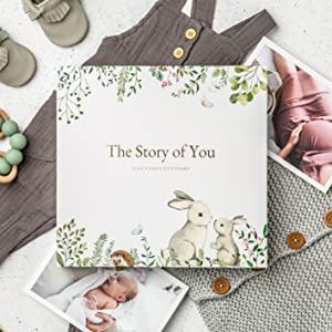 Shows timeless neutral design of the baby book for girl first year or baby first memory book boy.